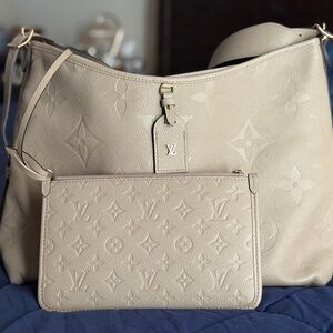 **SOLD** Louis Vuitton Cream Monogram Empreinte Leather with Detachable Pouch